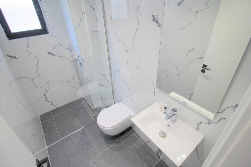Koupelna v ubytování Hotel Qurku 2