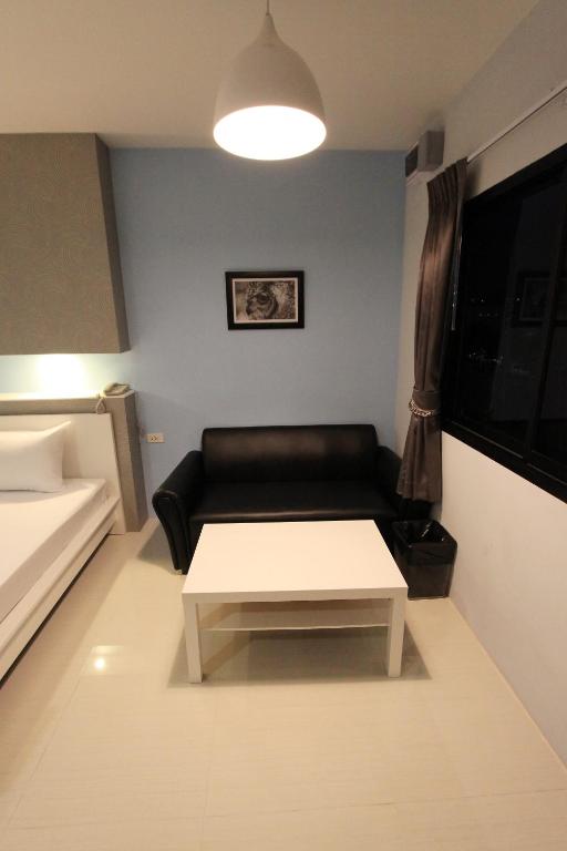 Postel nebo postele na pokoji v ubytování Eazy Motel B.a.n.g.n.a