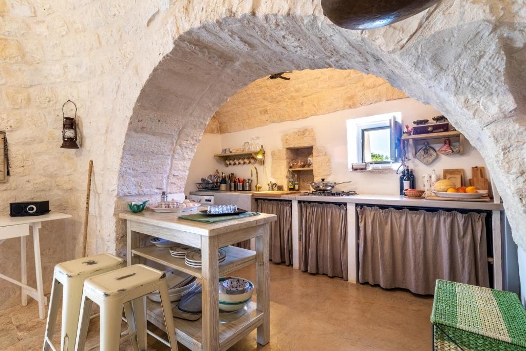 Kép Intero apt Trullo Colle Specchia szállásáról Cisterninóban a galériában