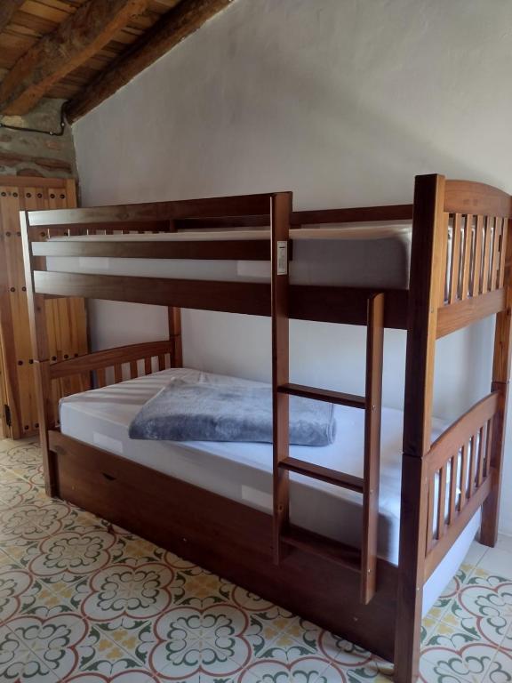 A bed or beds in a room at Casa Purujosa