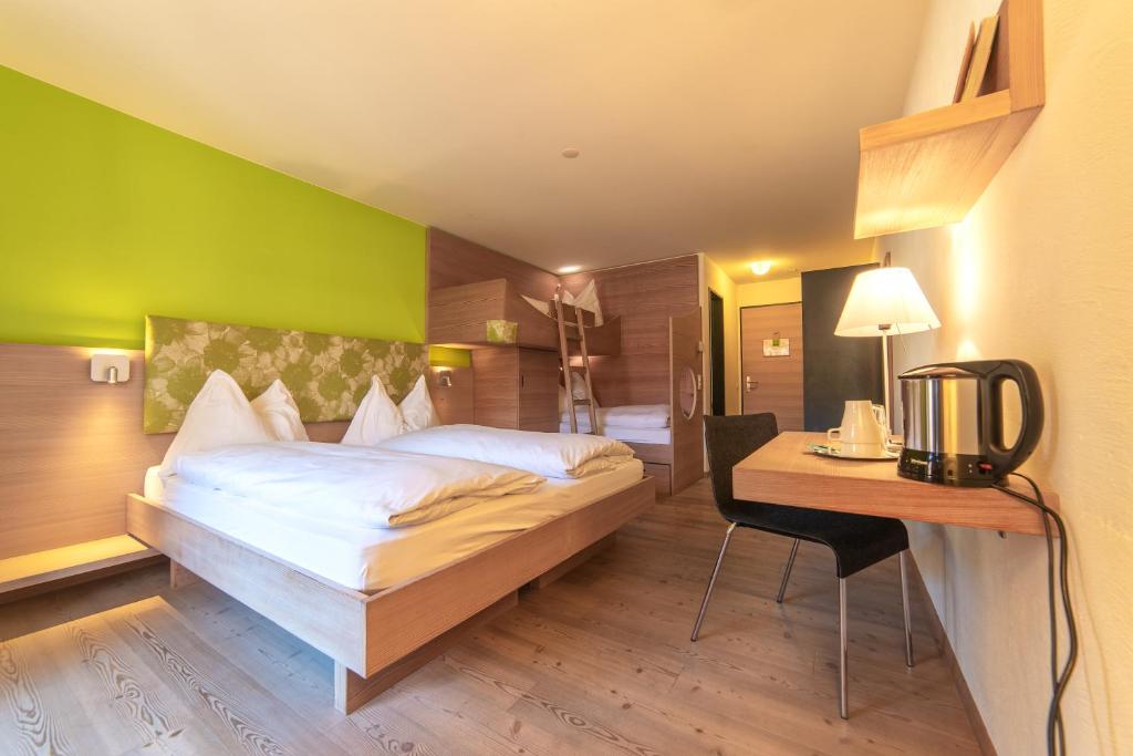 Postel nebo postele na pokoji v ubytování Hotel Ucliva