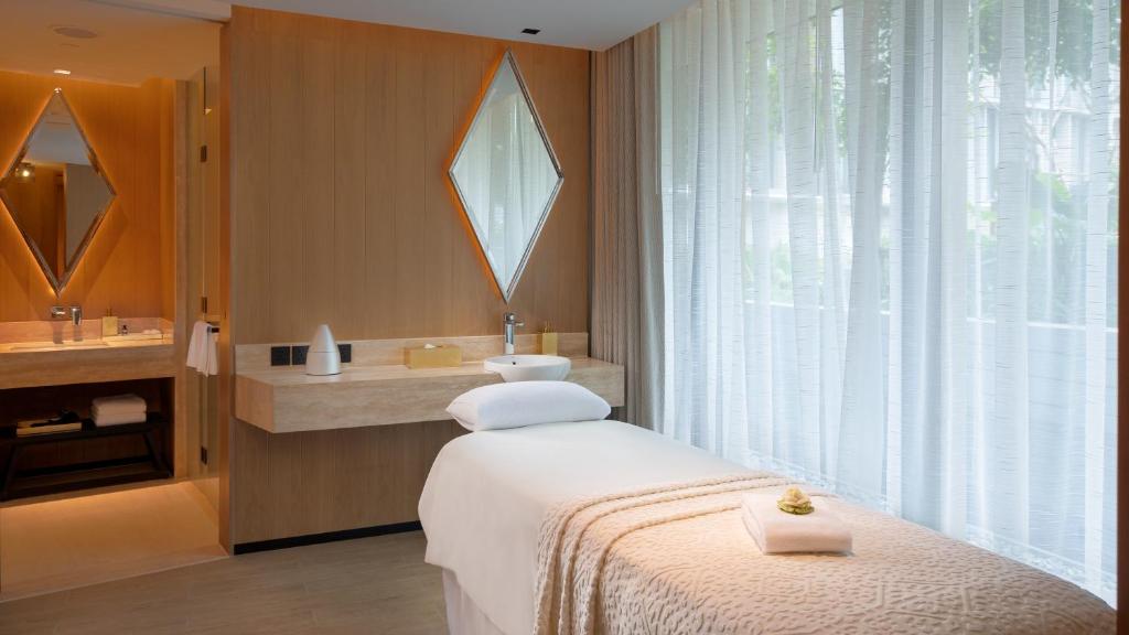 Postel nebo postele na pokoji v ubytování Hyatt Regency Phnom Penh