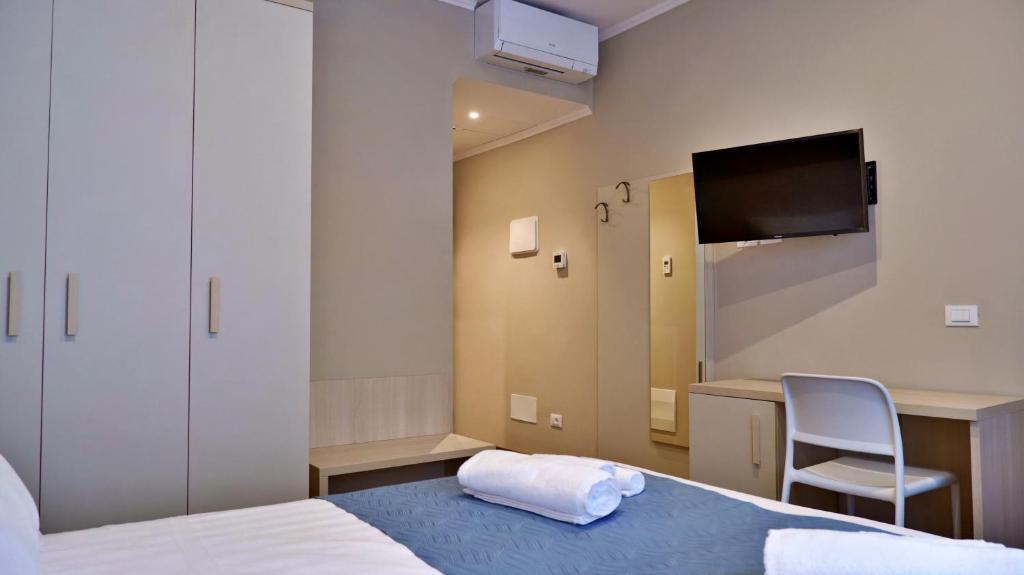 Postel nebo postele na pokoji v ubytování Pianomare Riviera Apartments and Rooms