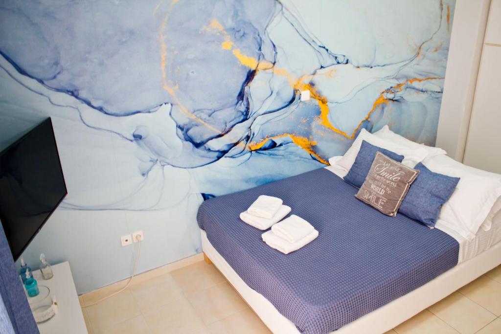 Postel nebo postele na pokoji v ubytování IOLI MINI HOME