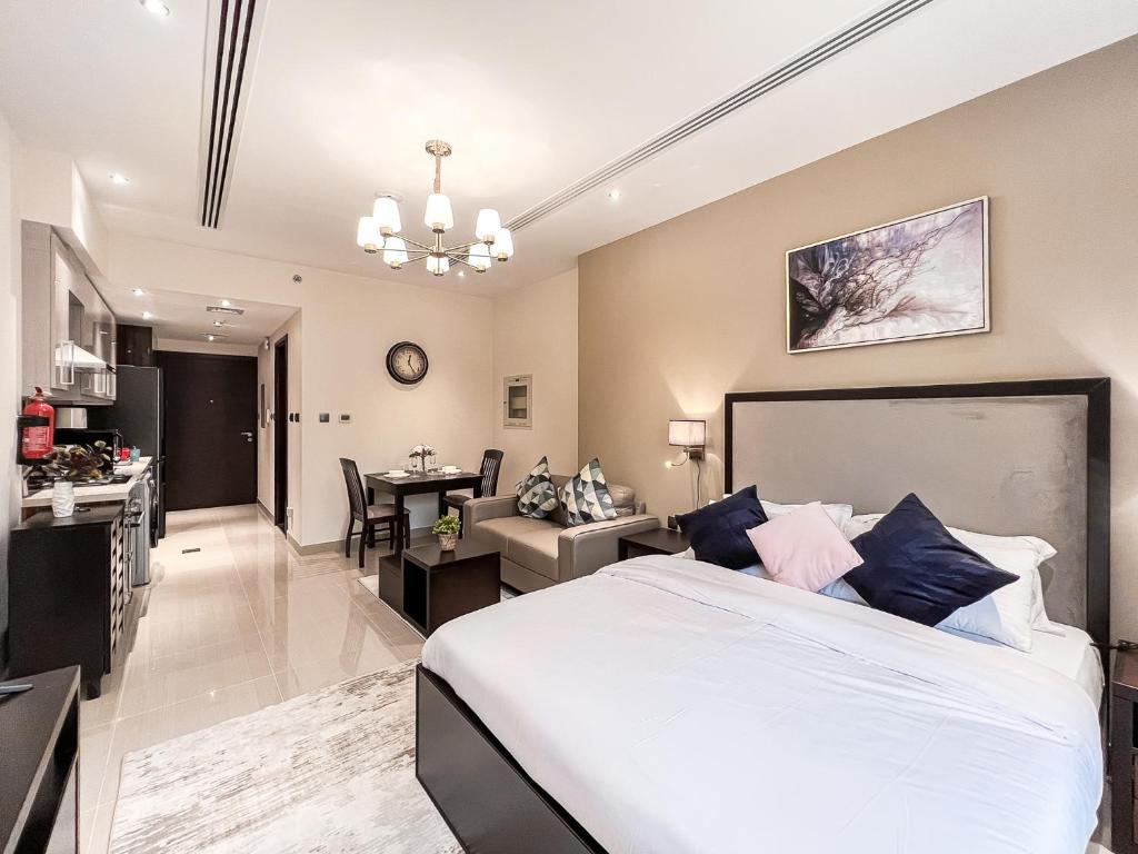 Postel nebo postele na pokoji v ubytování Luton Vacation Homes - Elite Residence Downtown, Dubai