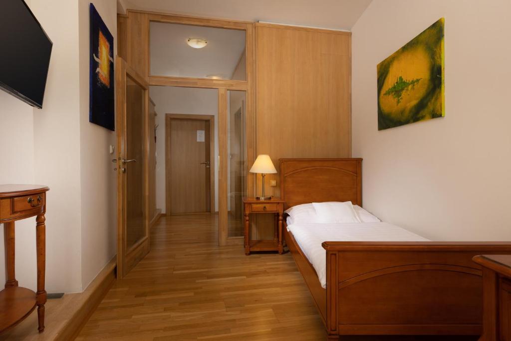 Cama o camas de una habitación en OREA Hotel Arigone Olomouc