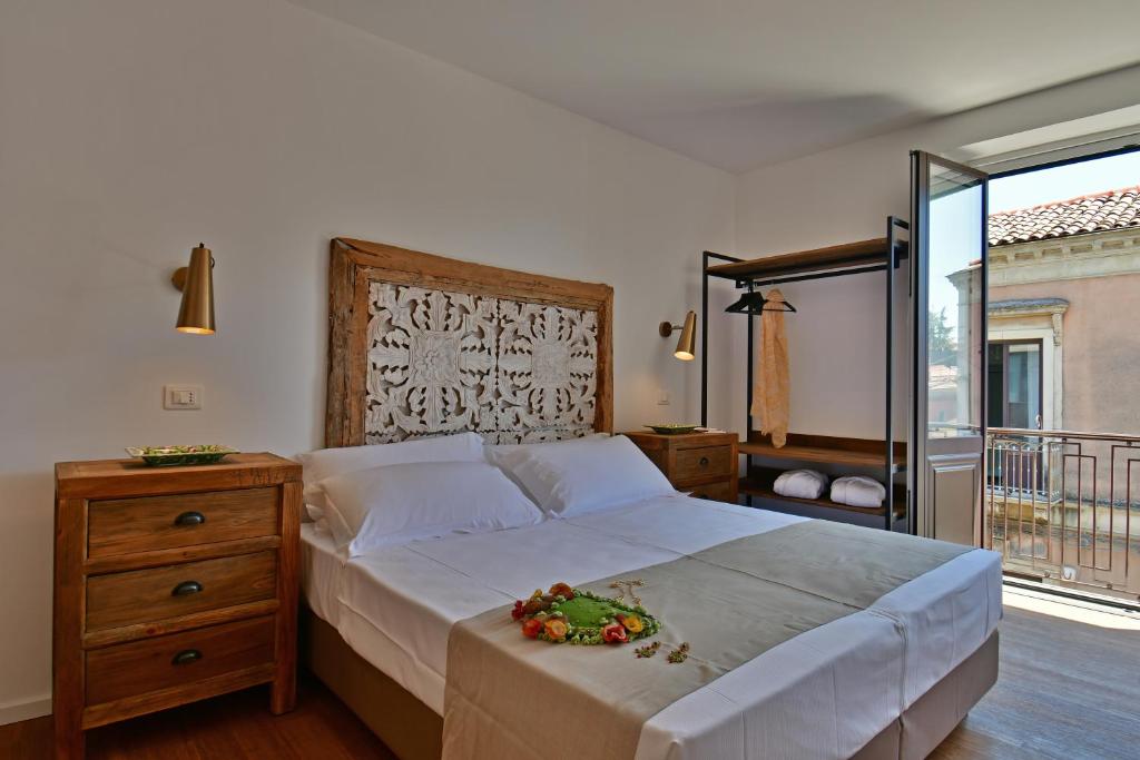 Postel nebo postele na pokoji v ubytování San Anton Hotel