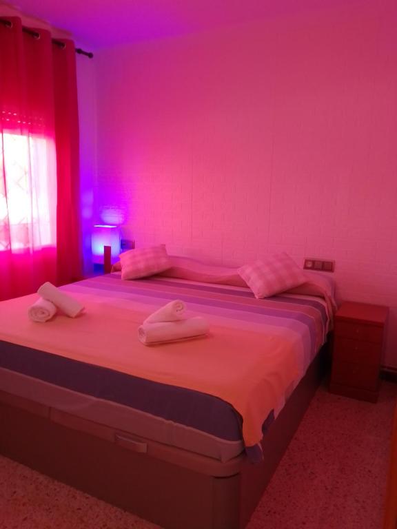 Posteľ alebo postele v izbe v ubytovaní Rooms Pineda