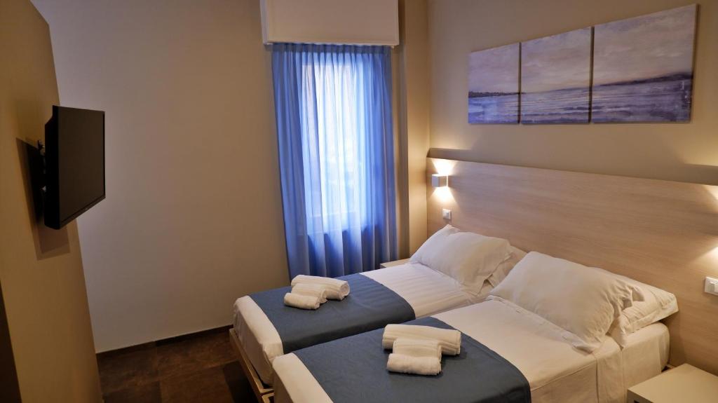 Postel nebo postele na pokoji v ubytování Pianomare Riviera Apartments and Rooms