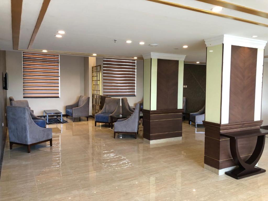 Posezení v ubytování Starlit Suites Tirupati