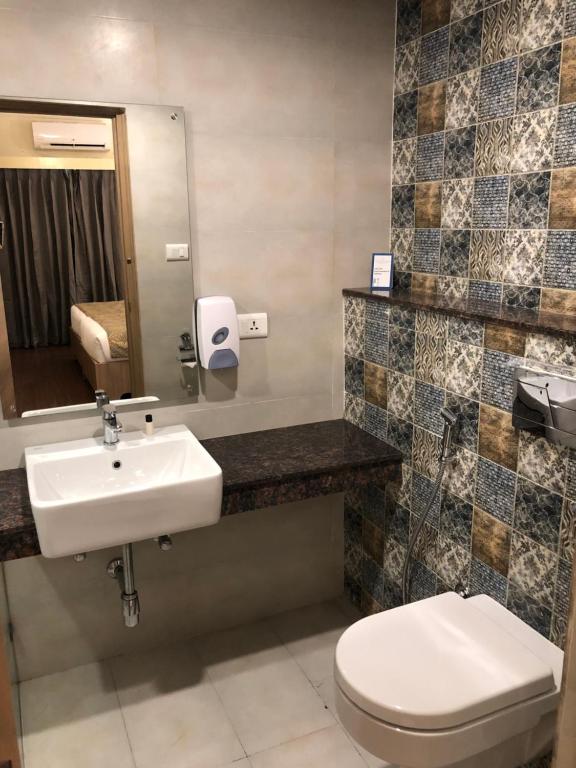 Koupelna v ubytování Starlit Suites Tirupati