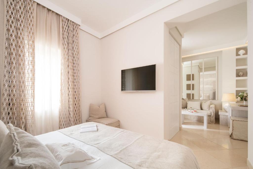 Postel nebo postele na pokoji v ubytování San Michele Suite