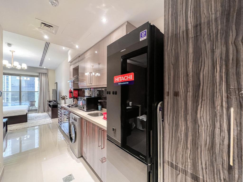 Kuchyň nebo kuchyňský kout v ubytování Luton Vacation Homes - Elite Residence Downtown, Dubai