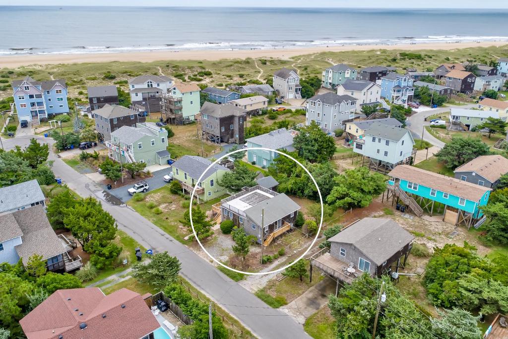 an aerial view of a house with a circle at AVHC23 Beach Box in Avon