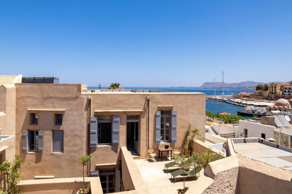 a house with a view of the water at AZADE Chania in Chania