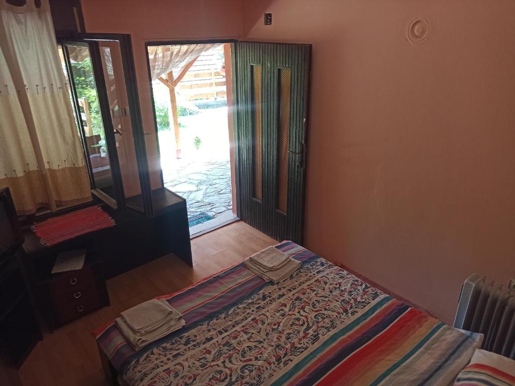 Postel nebo postele na pokoji v ubytování Kod Dace