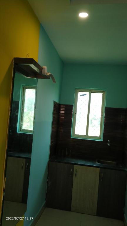 Kuchyň nebo kuchyňský kout v ubytování Ashirbad Guest House