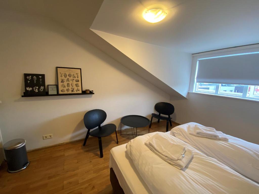 Postel nebo postele na pokoji v ubytování Day Dream Vesturgata 17 Reykjavik