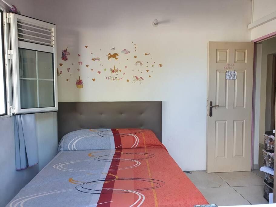 Postel nebo postele na pokoji v ubytování Magnifique Villa avec Jacuzzi (spa)