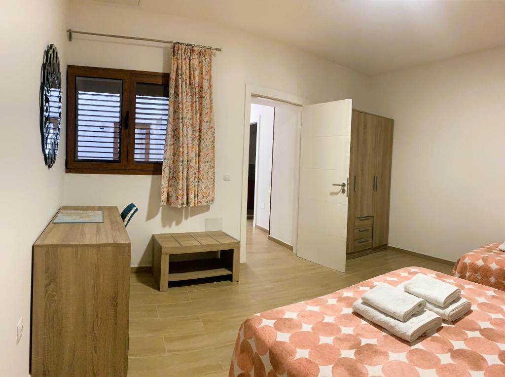 Postel nebo postele na pokoji v ubytování Apartamento La Cueva, Artenara