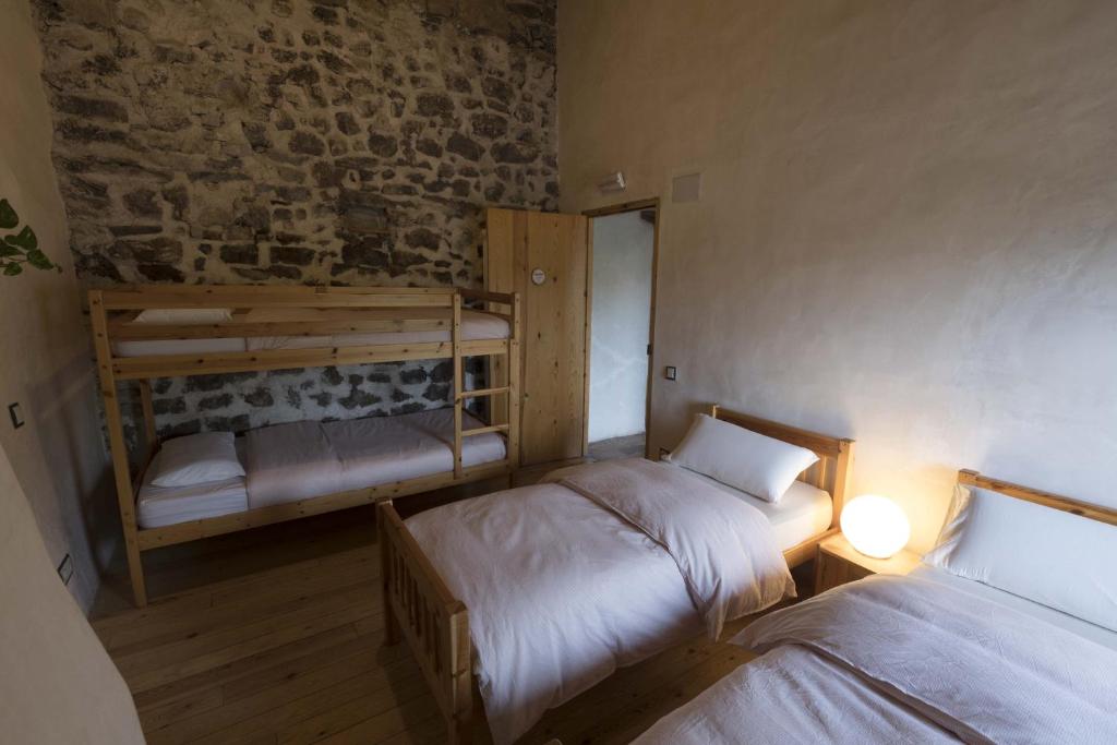 Postel nebo postele na pokoji v ubytování Mas rural El Negre