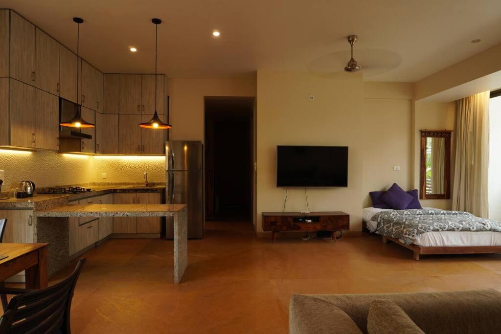 TV a/nebo společenská místnost v ubytování Iris by Le Pension Stays
