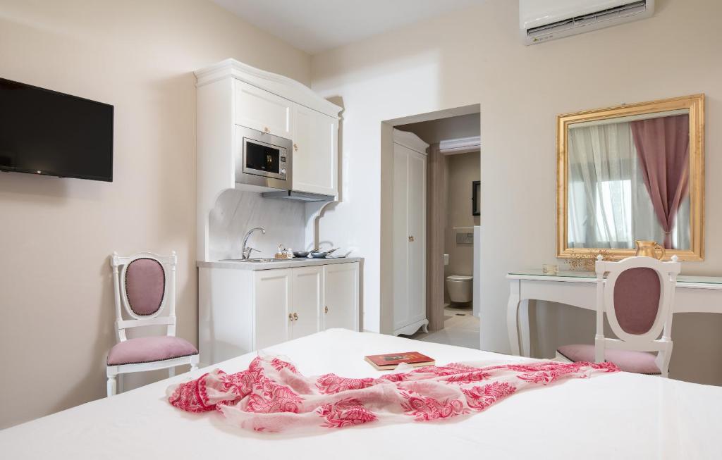 Postel nebo postele na pokoji v ubytování Mykoniatika Villas