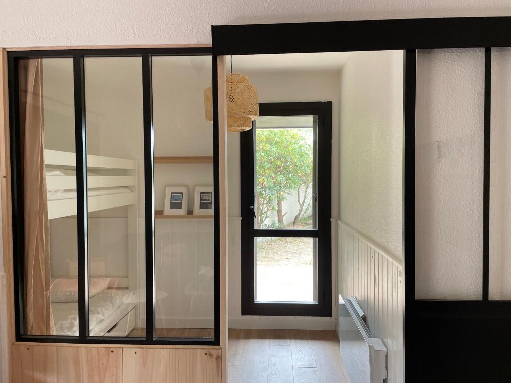 Posteľ alebo postele v izbe v ubytovaní Appartement à Seignosse océan 2 chb et jardin