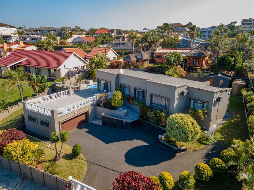 an aerial view of a house in a suburb at Vista Oceana – 4 Bedroom, Uvongo, Manaba Beach in Margate