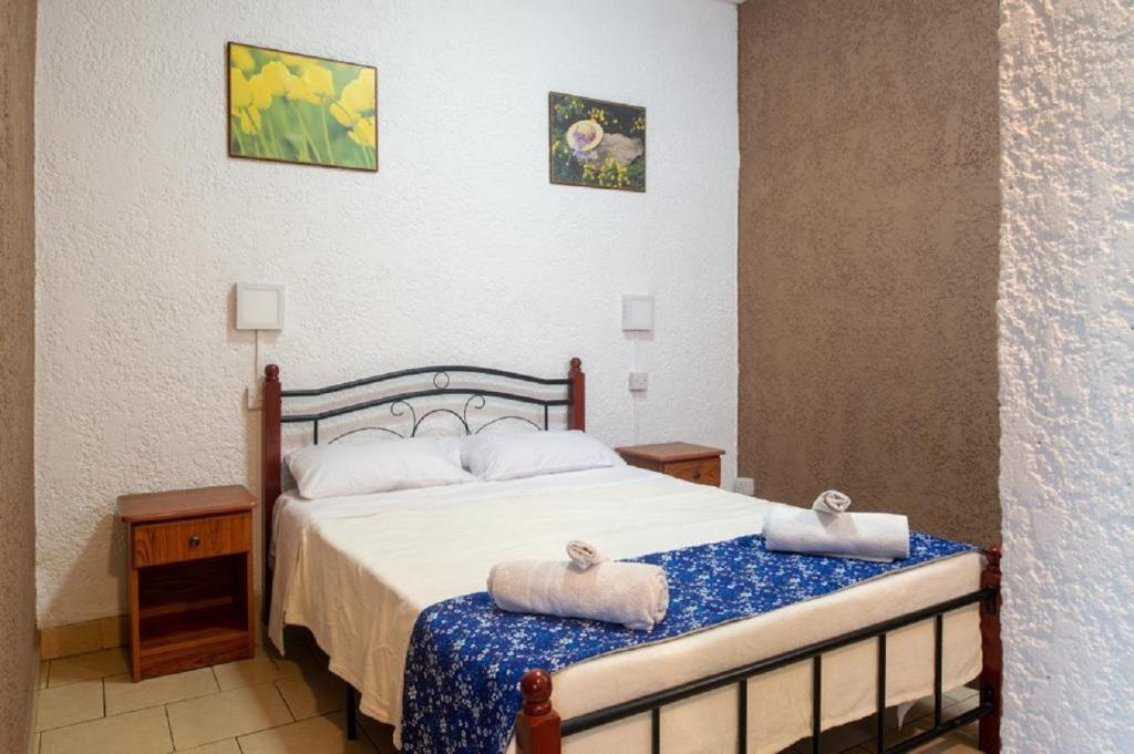 Postel nebo postele na pokoji v ubytování Chez Pepe Apartments
