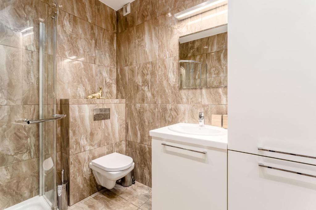 Kúpeľňa v ubytovaní Chill Apartments Mokotow Business Park