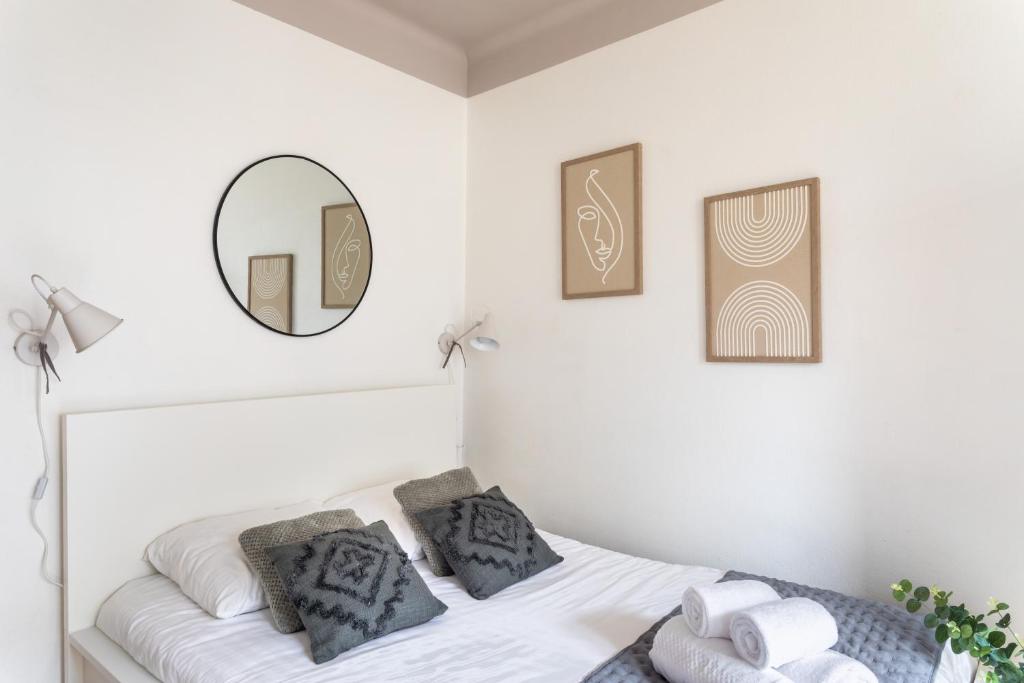 Posteľ alebo postele v izbe v ubytovaní MELI MELAINE - Appartement 3 chambres avec balcon centre historique