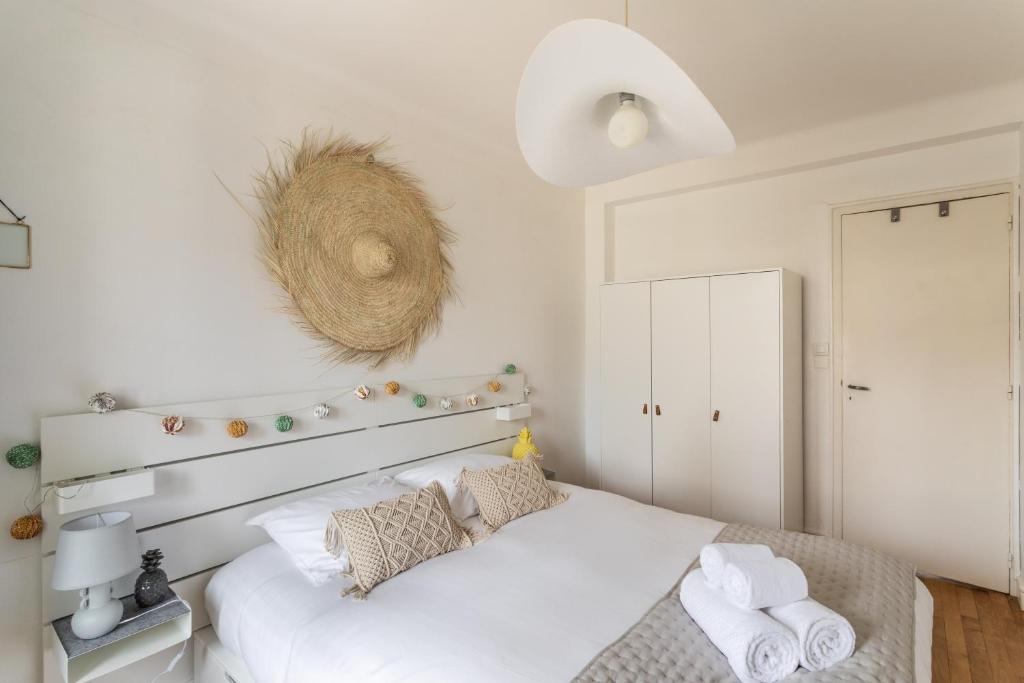 Posteľ alebo postele v izbe v ubytovaní MELI MELAINE - Appartement 3 chambres avec balcon centre historique