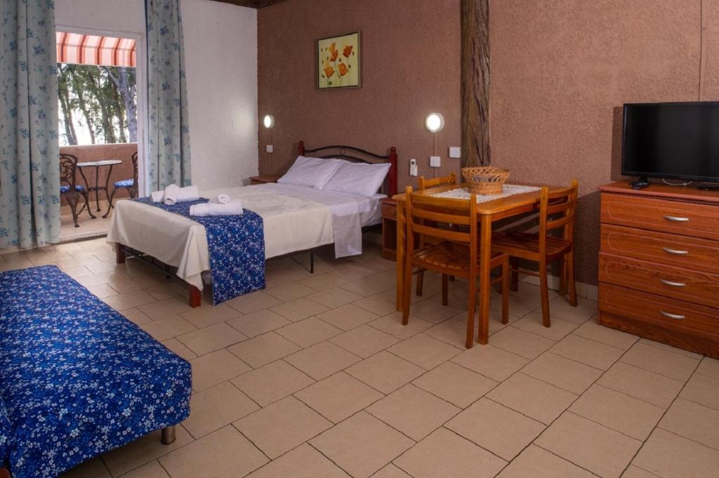 Postel nebo postele na pokoji v ubytování Chez Pepe Apartments