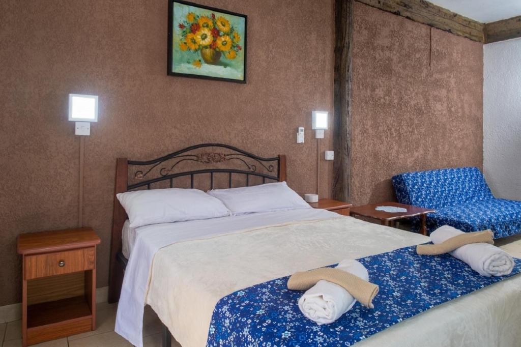 Postel nebo postele na pokoji v ubytování Chez Pepe Apartments