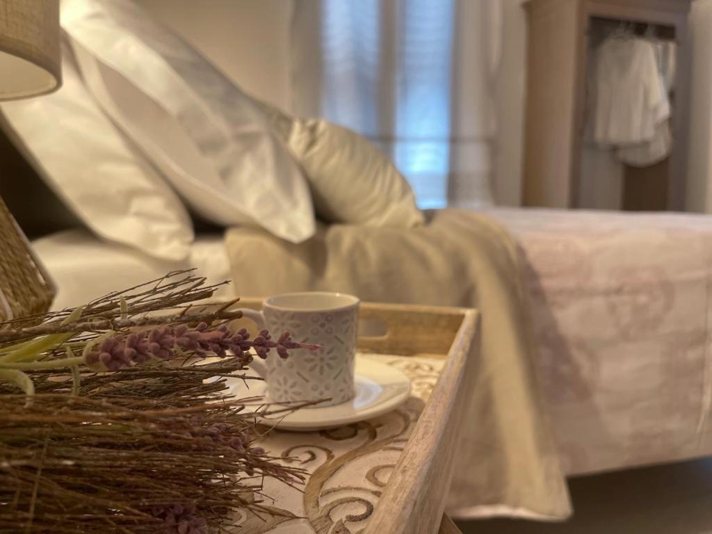 Postel nebo postele na pokoji v ubytování B&B Dimora Dorgali