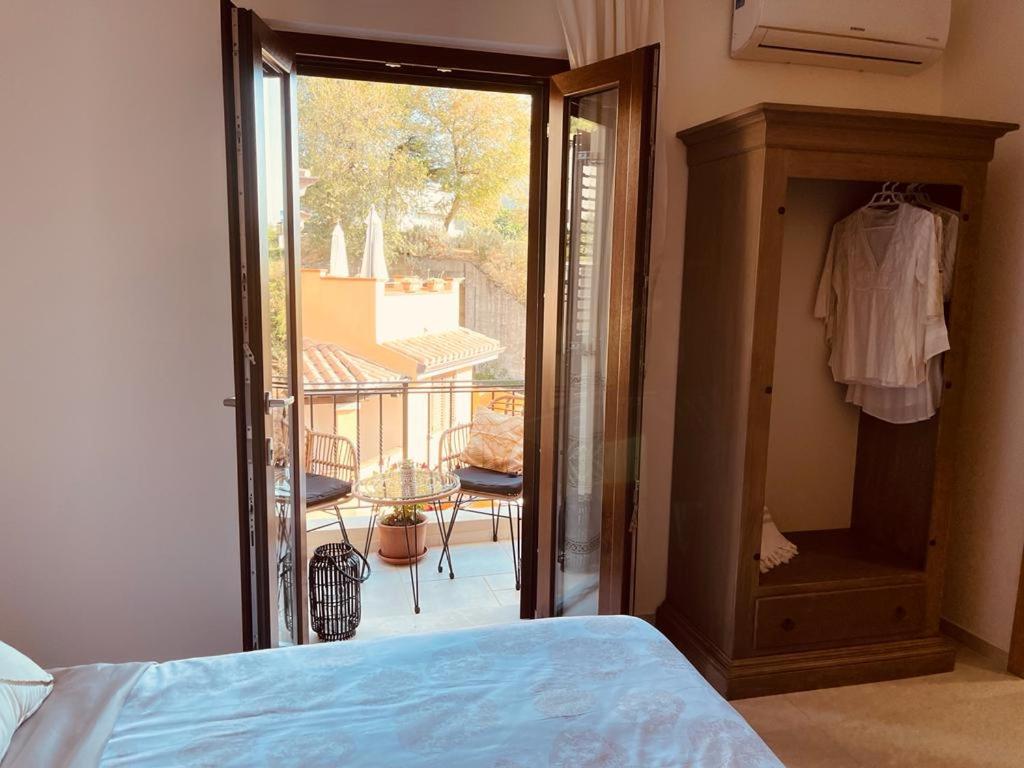 Postel nebo postele na pokoji v ubytování B&B Dimora Dorgali