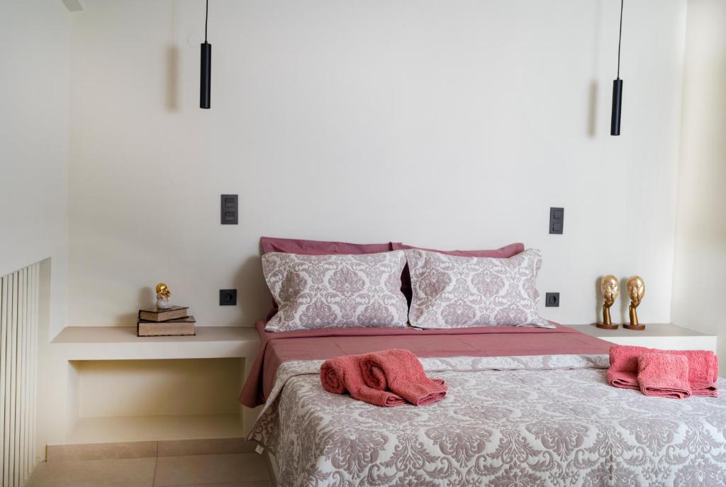 Postel nebo postele na pokoji v ubytování viapartments Ilekra Finikounda