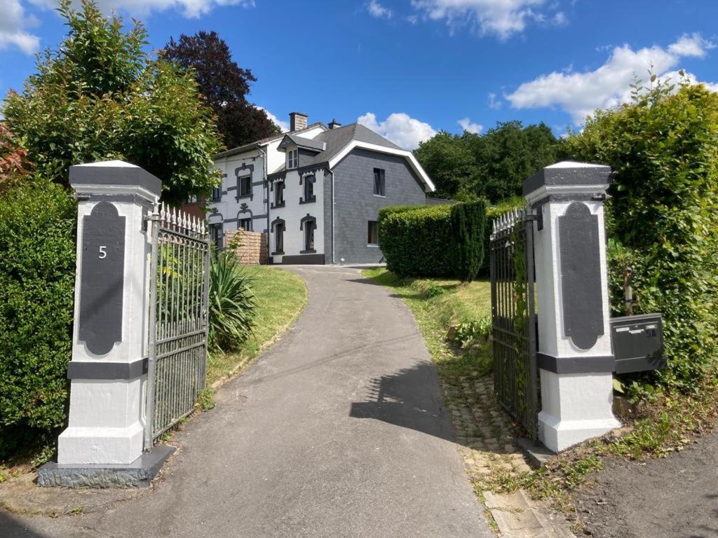 a driveway with a gate in front of a house at My house in Spa