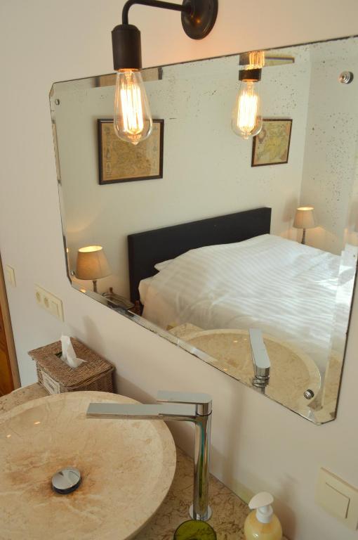 Postel nebo postele na pokoji v ubytování B&B Le Vieux Marronnier
