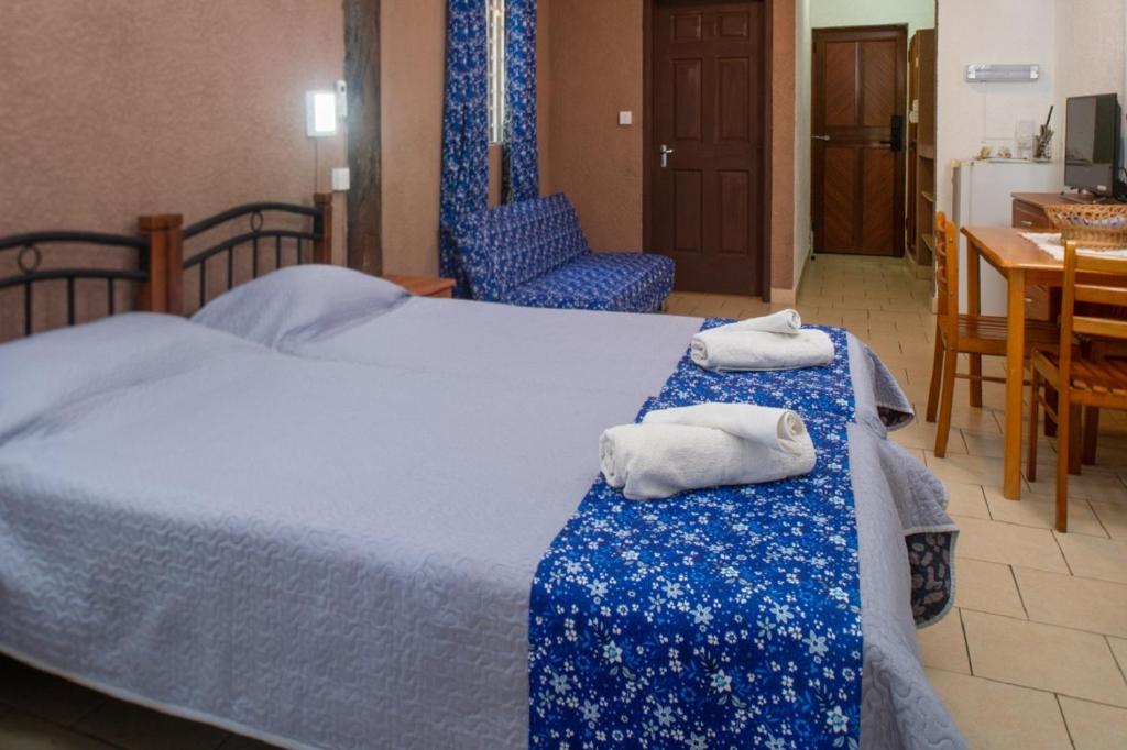 Postel nebo postele na pokoji v ubytování Chez Pepe Apartments