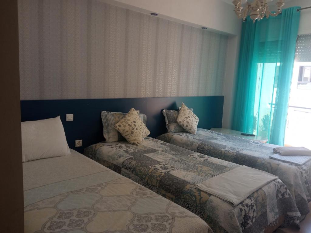 Postel nebo postele na pokoji v ubytování Chambre haut standing