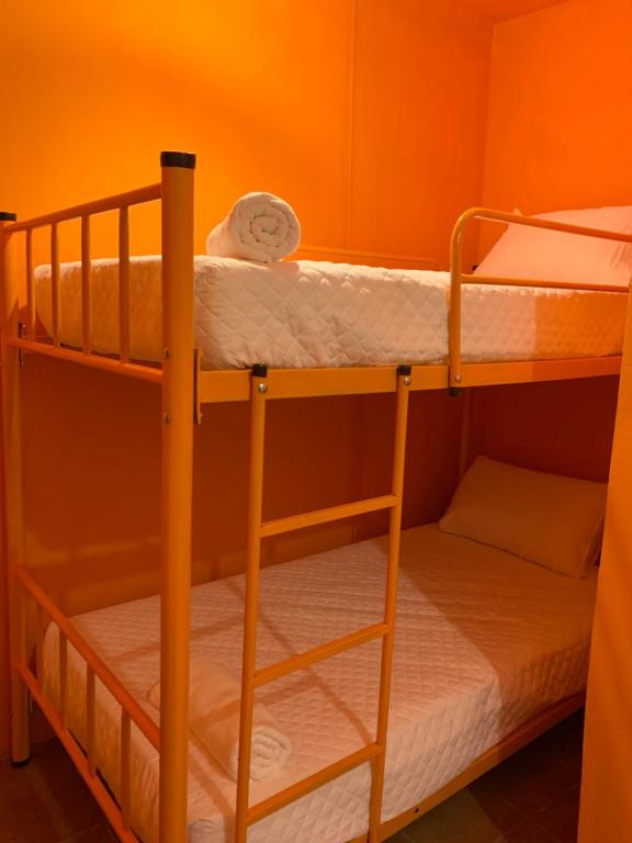 Postel nebo postele na pokoji v ubytování Why Not Hotel
