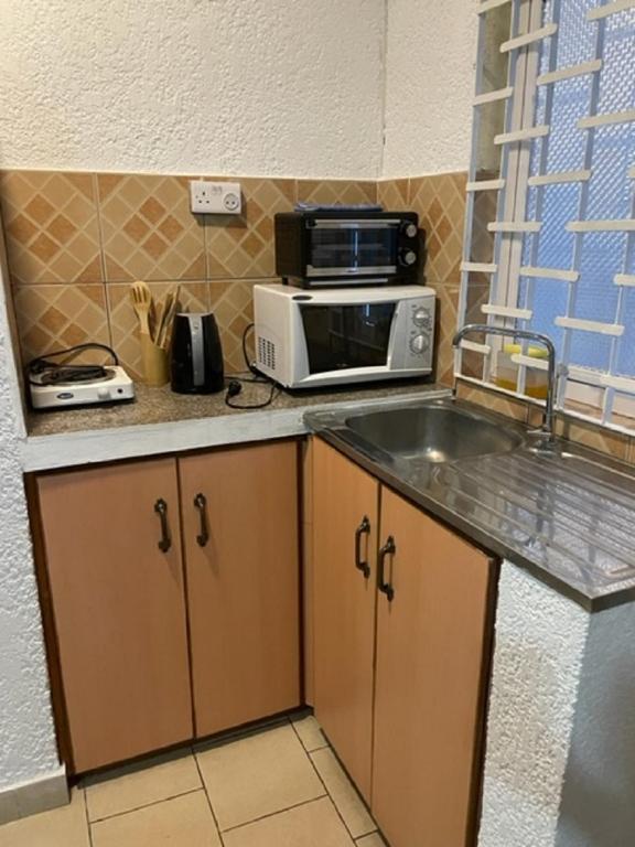 Kuchyň nebo kuchyňský kout v ubytování Chez Pepe Apartments