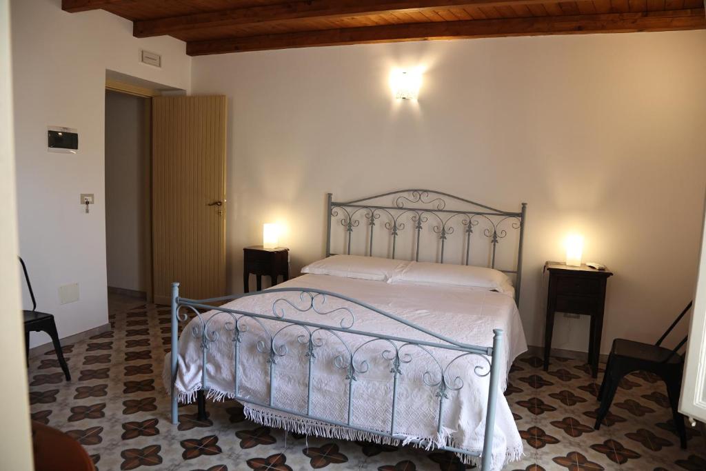 Łóżko lub łóżka w pokoju w obiekcie Charme in centro - Tourist rental