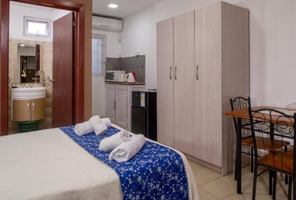 Postel nebo postele na pokoji v ubytování Chez Pepe Apartments