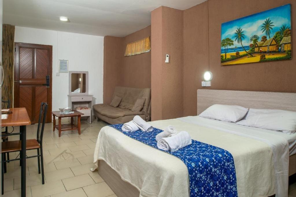 Postel nebo postele na pokoji v ubytování Chez Pepe Apartments