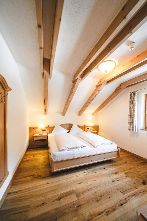 Postel nebo postele na pokoji v ubytování Hotel Christoph