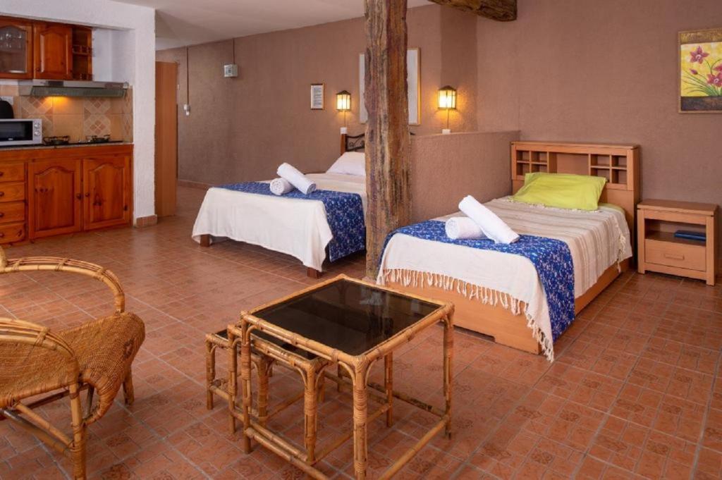Postel nebo postele na pokoji v ubytování Chez Pepe Apartments