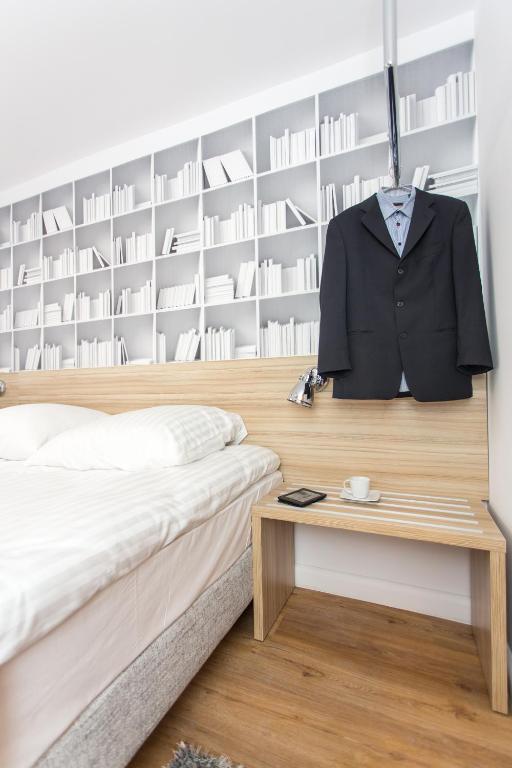 Posteľ alebo postele v izbe v ubytovaní Smart Hotel